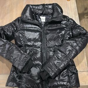 SAM. Black women’s “freestyle” puffer, size small